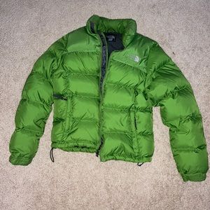 Green puffy north face jacket